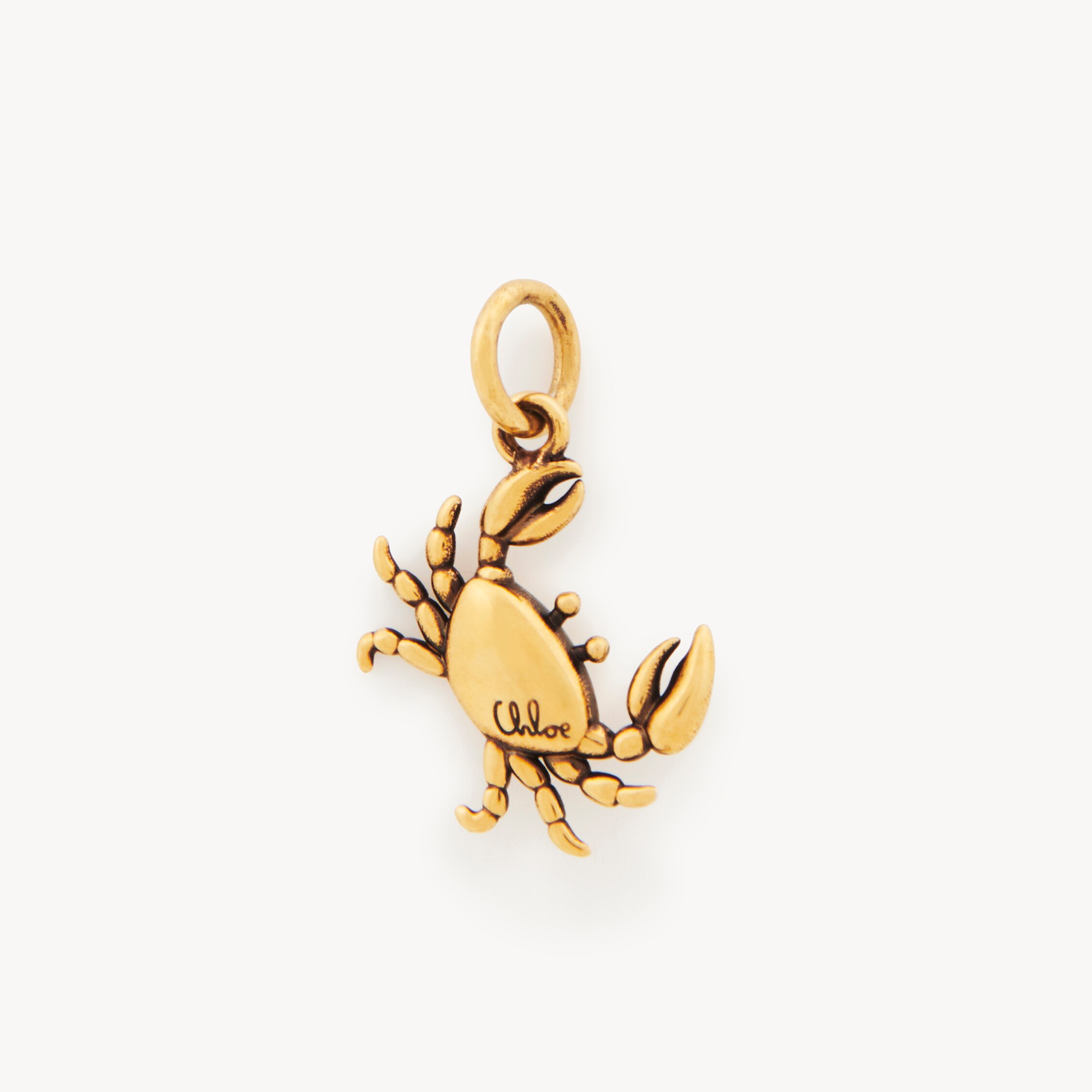 Chloé Alphabet Crab Charm In Brass In Gold