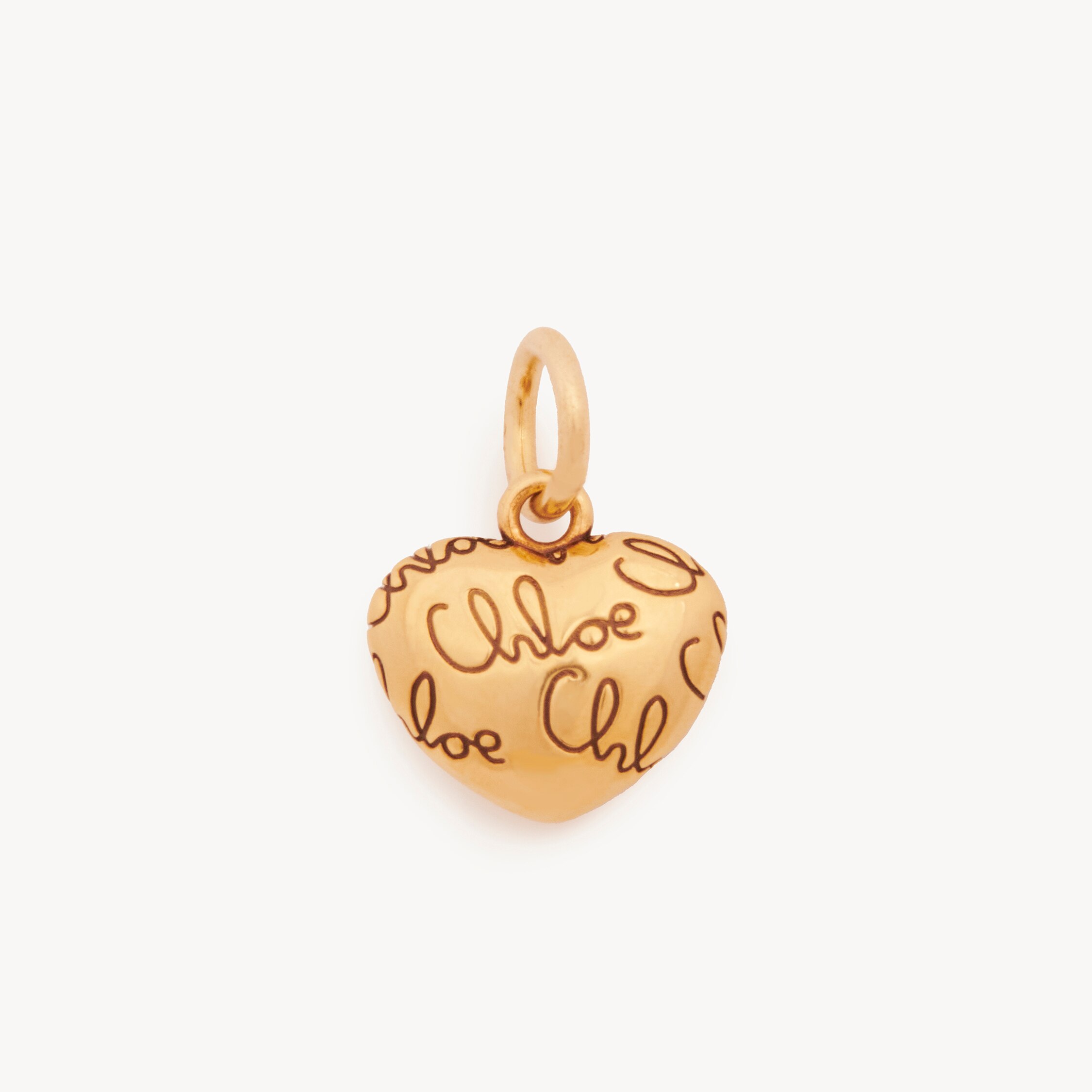 Chloé Alphabet Heart Logo Charm In Brass In Gold